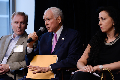 Franciso Kjolseth  |  The Salt Lake Tribune
Senator Orrin Hatch, center, joins a group of entrepreneurs and tech leaders for an immigration panel discussion to explain why immigration is important to hi-tech industries. Also pictured are Darren Lee with Proofpoint Inc. and Amy Rees of REES Capital. The discussion at Proofpoint Inc., in Draper, Utah on Friday, April 25, 2014, is part of a 12 city tour within two weeks in an effort to keep America's tech sector competitive.