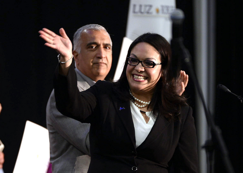Scott Sommerdorf   |  The Salt Lake Tribune
Luz Robles, candidate for Congress in Utah's 2nd Congressional District, takes the stage at the Utah Democratic Convention after being introduced by Salt Lake District Attorney Sim Gill, Saturday, April 26, 2014.