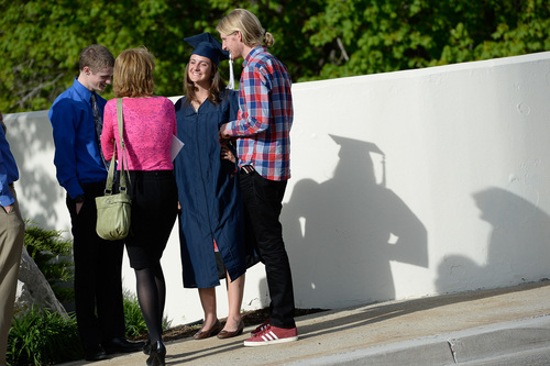 Franciso Kjolseth  |  The Salt Lake Tribune
Jasmyn Hicks is the center of attention alongside her mom Lisa, second from left, and brothers Levi, left, and Colton as the BYU class of 2014 celebrates following commencement ceremonies at the Marriott Center in Provo on Thursday, April 24, 2014.