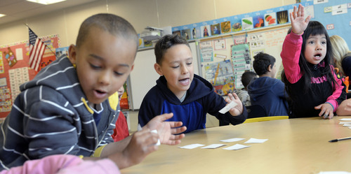 Al Hartmann  |  The Salt Lake Tribune
Kindergartners at Midvale Elementary play a spirited word matching game Thursday April 24. The Title I school in Salt Lake County caters to a growing population of immigrants, and its students have higher than average immunization rates. Families from developing countries tend to value vaccines because many have seen firsthand the toll of contagious disease.