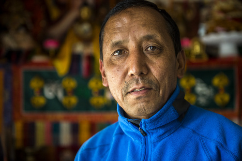 Chris Detrick  |  The Salt Lake Tribune
Apa Sherpa poses for a portrait at his home in Draper Tuesday April 29, 2014. Apa Sherpa, world record holder with 21 summits of Mount Everest, is back from Nepal. He wasn't climbing, but delivering money and computers to villages in the Himlayan Highlands. While in Nepal 16 Sherpas died in an avalanche on Everest.