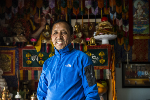 Chris Detrick  |  The Salt Lake Tribune
Apa Sherpa poses for a portrait at his home in Draper Tuesday April 29, 2014. Apa Sherpa, world record holder with 21 summits of Mount Everest, is back from Nepal. He wasn't climbing, but delivering money and computers to villages in the Himlayan Highlands. While in Nepal 16 Sherpas died in an avalanche on Everest.