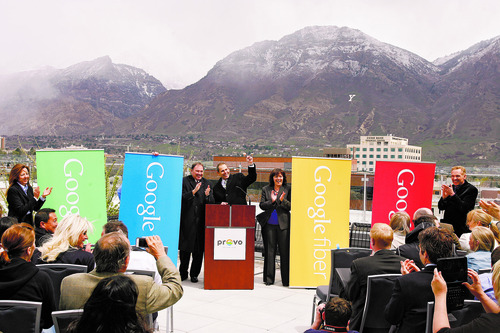 Rick Egan  | Tribune file photo
Provo Mayor John Curtis, along with Gov. Herbert (left) and Rebecca Lockhart (right) makes the announcement that Provo will become one of Google's Fiber Optic cities, Wednesday, April 17, 2013.