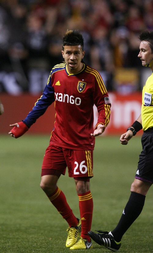 Kim Raff  |  The Salt Lake Tribune
Real Salt Lake midfielder Sebastian Velasquez (26) argues with the referee about a call as Real Salt Lake trails by two late in the second half at Rio Tinto in Sandy on April 27, 2013. Real Salt Lake lost the game 2-0.