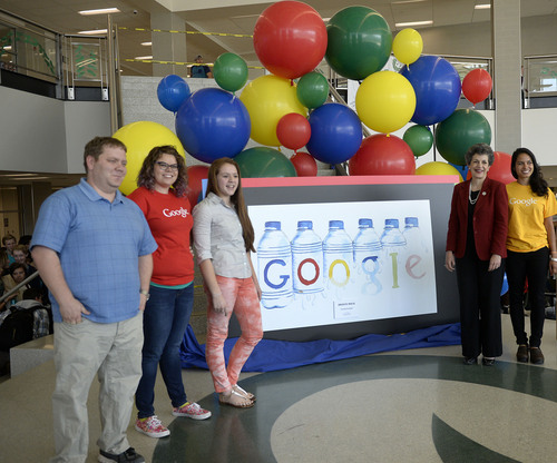 Al Hartmann  |  The Salt Lake Tribune
Olympus High School10th-grader Bronte Mack takes the stage as she's announced as the Utah winner in the seventh annual Doodle 4 Google competition. Jeremy Pettersen, Olympus art teacher, left, Google representative Brittany Blackmon, winner Bronte Mack, Rep. Patrice Arent and Google's Joelle Murphy pose for a picture in front of her winning design at the announcement Tuesday, April 29.