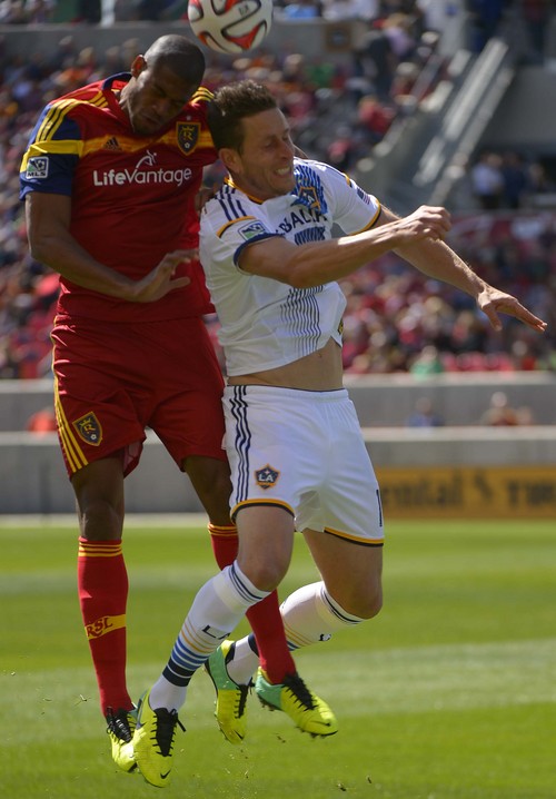Leah Hogsten  |  The Salt Lake Tribune
Real Salt Lake defender Chris Schuler (28) and Los Angeles Galaxy forward Rob Friend (16) on a header.Real Salt Lake and the L.A. Galaxy are 1-1 at the half during Saturday's, March 22, 2014 home opener at Rio Tinto Stadium.