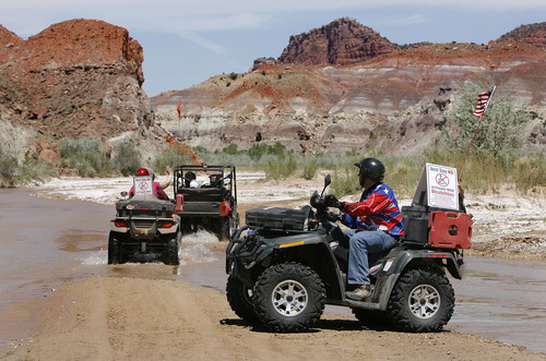 ATV PROTEST
ATV'ers pass deeper into the National Monument along the Paria Riverbed. ATV and off-road vehicle riders numbering just over 100 protested BLM road closures in Grand Staircase-Escalante National Monument and will gather to force their way onto federal land. They will be criss-crossing the Paria River. Saturday, 5/9/09.
Scott Sommerdorf/The Salt Lake Tribune