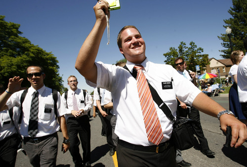 Leah Hogsten  |  The Salt Lake Tribune
Elder Samuel Heinzen and fellow missionaries were the last entrant of the parade. Thousands flocked to downtown Salt Lake City this morning for the Days of 47 Parade, a commemoration of the day Brigham Young and many LDS pioneers first reached the Salt Lake Valley.