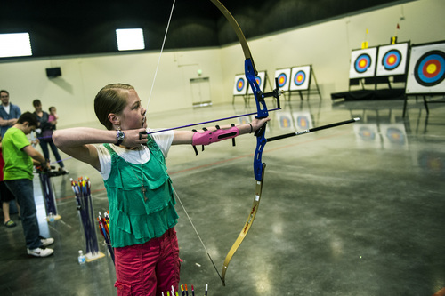Chris Detrick  |  The Salt Lake Tribune
Marlane Stevens, 11, of Bountiful, tests out archery gear at Easton Salt Lake Archery Center Saturday April 12, 2014. Easton Salt Lake Archery Center will open April 15th as a new state-of-the-art archery training center in Salt Lake City, providing Utah with one of the world's premier archery training venues. This world-class facility boasts one of the largest dedicated indoor ranges in the world and also has outdoor and 3D ranges.