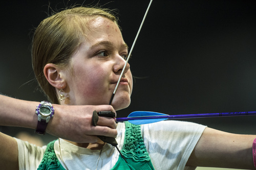 Chris Detrick  |  The Salt Lake Tribune
Marlane Stevens, 11, of Bountiful, tests out archery gear at Easton Salt Lake Archery Center Saturday April 12, 2014. Easton Salt Lake Archery Center will open April 15th as a new state-of-the-art archery training center in Salt Lake City, providing Utah with one of the world's premier archery training venues. This world-class facility boasts one of the largest dedicated indoor ranges in the world and also has outdoor and 3D ranges.