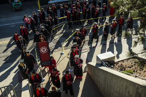 Chris Detrick  |  The Salt Lake Tribune
Students walk into the Huntsman Center before the University of Utah's 2014 Commencement Ceremonies Thursday May 1, 2014.