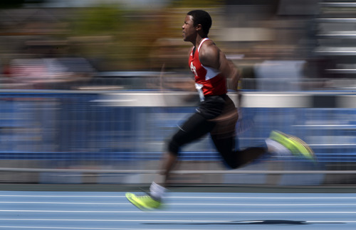 Rick Egan  |  The Salt Lake Tribune

Jonah Trinnaman, American Fork, leads his heat in the boys 100 meter dash, in prep track action at the BYU invitational at Clarence Robison Track in Provo, Friday, May 2, 2014