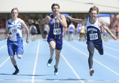 Rick Egan  |  The Salt Lake Tribune

Anthony Rivera (right) places first in the heat in the boys 100, followed by Cason DeForest, North Summit (center) and  Branson Orton, Beaver (left) in prep track action at the BYU invitational at Clarence Robison Track in Provo, Friday, May 2, 2014