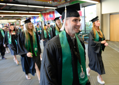 Franciso Kjolseth  |  The Salt Lake Tribune
Ben Aldana, center, graduating with a degree in behavioral sciences, makes his way to commencement ceremonies at Utah Valley University last week. Aldana who is now 33, is an ex-con who landed in jail at the age of 23 and did 6 1/2 years in federal prison before turning his life around.