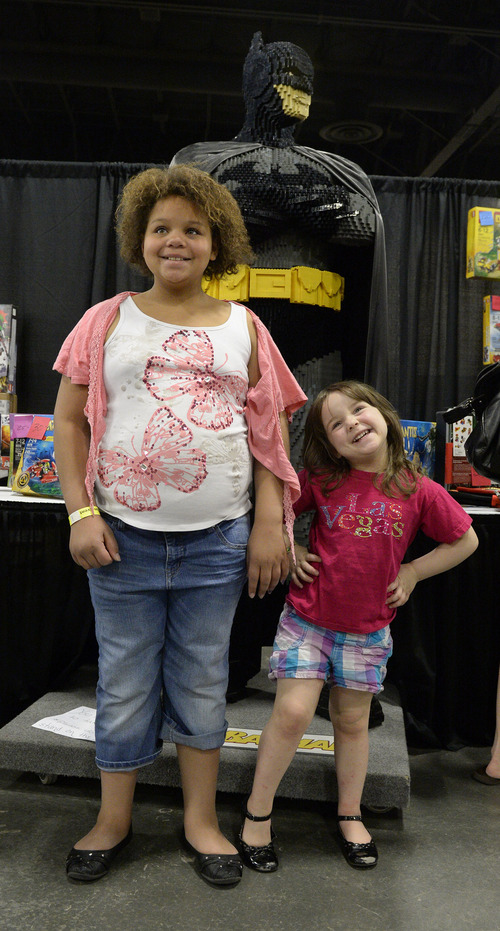 Rick Egan  |  The Salt Lake Tribune

Jonna McEltrath and Delilah Stoltz pose in front of a Batman made of LEGOS, at the South Towne Expo Center, Saturday, May 3, 2014. The BrickSlopes event included LEGO creations from master builders across the U.S. plus a play area for kids with more than 50,000 LEGO bricks.
