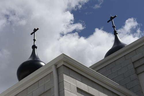 Scott Sommerdorf   |  The Salt Lake Tribune
Two onion-shaped domes contrast with the more modern, angular look of the rest of the new St. George Russian Orthodox Church at 1300 West, 6800 South, in West Jordan, Wednesday, April 23, 2014.