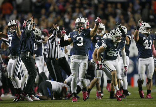 Scott Sommerdorf   |  The Salt Lake Tribune
BYU LB Kyle Van Noy, 3, and other defensive players celebrate a fumble recovery late in the first half. BYU held a 24-3 lead over Boise State, Friday, October 25, 2013