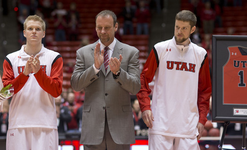 Lennie Mahler  |  The Salt Lake Tribune
Fans recognize seniors Xan Ricketts, left, and Renan Lenz, right, along with head coach Larry Krystkowiak, center, in a ceremony before a game against Colorado at the Huntsman Center, Saturday, March 1, 2014.