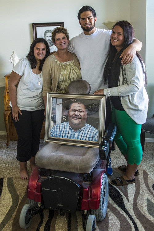 Chris Detrick  |  The Salt Lake Tribune
Former Utah State tight end D.J. Tialavea poses for a portrait with his mom Tami, dad Don, and sisters Abigail and Julianne at their home in West Jordan Friday May 2, 2014.