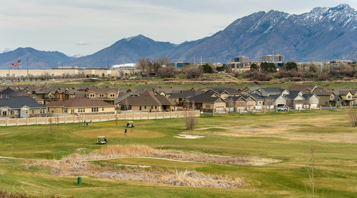 Trent Nelson  |  The Salt Lake Tribune
South Jordan residents are attempting to save Mulligans Golf Course and the open space it sits on, all owned by South Jordan, from development. Golfers played the course near an adjacent development Saturday March 29, 2014.