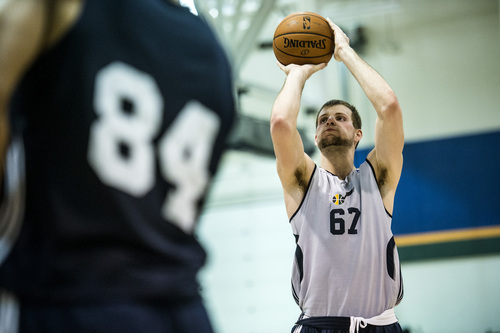 Chris Detrick  |  The Salt Lake Tribune
Taylor Braun shoots around during a workout at the Zions Bank Basketball Center Wednesday May 7, 2014.