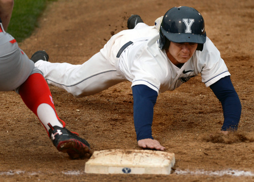 Steve Griffin  |  The Salt Lake Tribune


BYU's Eric Urry dives back to first base during baseball game against Utah at Miller Park on the campus of BYU in Provo, Utah Tuesday, May 6, 2014.