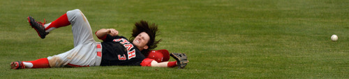Steve Griffin  |  The Salt Lake Tribune


Utah second baseman Kody Davis crashes to the ground after just missing the ball on a diving catch during baseball game against BYU at Miller Park on the campus of BYU in Provo, Utah Tuesday, May 6, 2014.