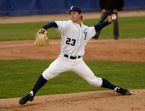 Steve Griffin  |  The Salt Lake Tribune


BYU pitcher Hayden Rogers delivers a pitch during baseball game against Utah at Miller Park on the campus of BYU in Provo, Utah Tuesday, May 6, 2014.