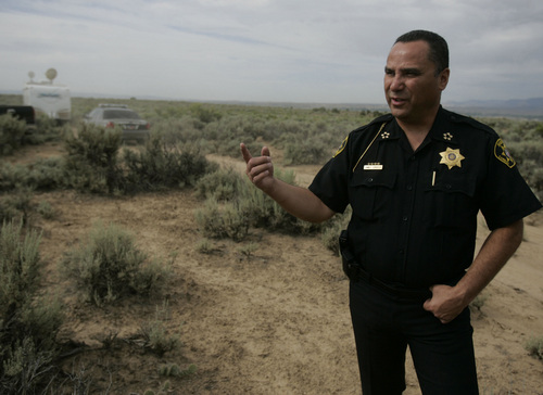 Carbon County Sheriff James Cordova talks about a fatal helicopter crash in Price Sunday, July 20, 2008 WEST of the Carbon County Airport. Three men were killed Saturday shortly after their helicopter crashed to the WEST of the Carbon County Airport after refueling. -- 7/20/08 (Jim Urquhart/The Salt Lake Tribune)