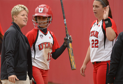 Leah Hogsten  |  The Salt Lake Tribune
Utah head coach Amy Hogue celebrates Trina Gomez's scoring run. University of Utah women's softball team defeated Southern Utah University 12-4 during their first game of a doubleheader, Tuesday, April 22, 2014.