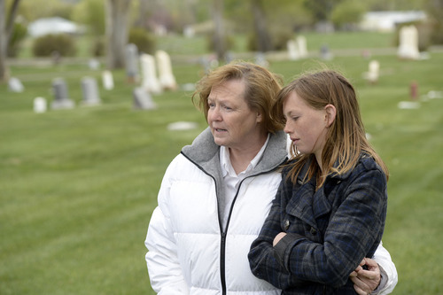 Al Hartmann  |  The Salt Lake Tribune
Midwife Donna Young and her daughter Holt, look at a grave markers of stillborn and newborn children in Rock Point Cemetery in Maeser just north of Vernal.  She started noticing a higher than usual amounts of stillborn and newborn deaths in the area the past few years.  One corner of the cemetery has several small markers for stillborn and newborn  deaths.    
 The TriCounty Health Department is holding a public meeting Wednesday May 7 to investigate the uptick in stillbirths and newborn deaths in the area. Environmentalists believe there's a connection to air pollution from oil and gas drilling.