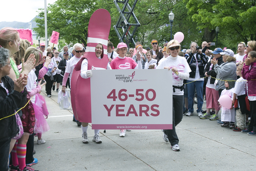 Melissa Majchrzak  |  Special to the Tribune
Survivors of Breast Cancer walk in the Survivor Parade at the Susan G. Komen 18th Annual Race for the Cure at Library Square.