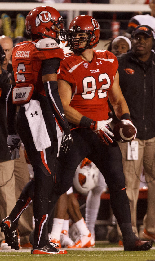 Trent Nelson  |  The Salt Lake Tribune
Utah Utes tight end Jake Murphy (82) yells after carrying the ball for yardage as the University of Utah hosts Oregon State, college football at Rice Eccles Stadium Saturday, September 14, 2013 in Salt Lake City.