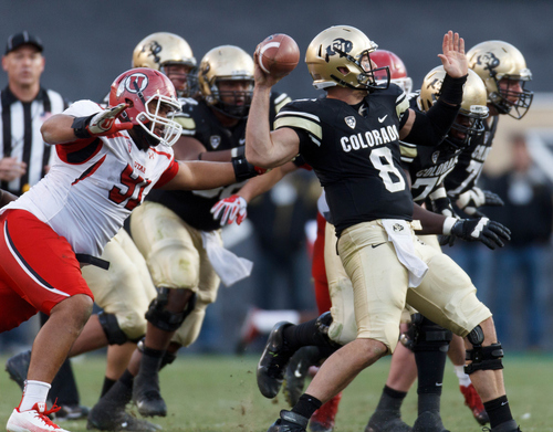 Trent Nelson  |  The Salt Lake Tribune
Utah Utes defensive tackle Tenny Palepoi (91) closes in on Colorado Buffaloes quarterback Nick Hirschman (8) as the Colorado Buffaloes host the University of Utah Utes, college football Friday November 23, 2012 in Boulder.