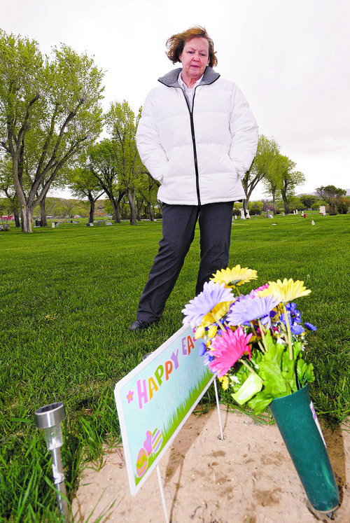 Al Hartmann  |  The Salt Lake Tribune
Midwife Donna Young looks at a grave marker of a stillborn child in Rock Point Cemetery in Maeser just north of Vernal.  She started noticing a higher than usual amounts of stillborn and newborn deaths in the area the past few years.  One corner of the cemetery has several small markers for stillborn and newborn  deaths.    
The TriCounty Health Department is holding a public meeting Wednesday May 7 to investigate the uptick in stillbirths and newborn deaths in the area. Environmentalists believe there's a connection to air pollution from oil and gas drilling.