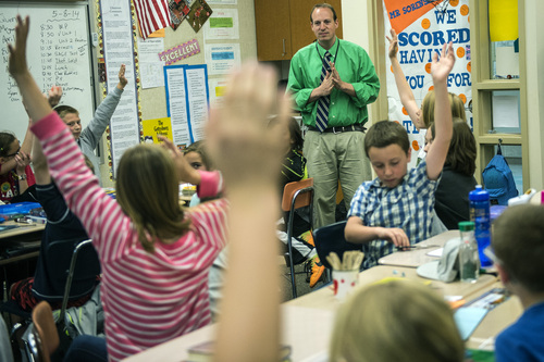 Chris Detrick  |  The Salt Lake Tribune
Students participate during Mike Sorensen's fifth-grade class at Highland Park Elementary School Thursday May 8, 2014.