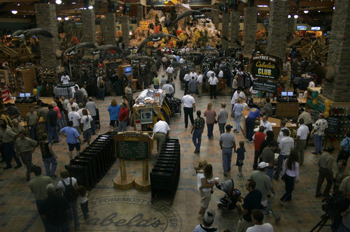 Tribune file photo
Crowds rushed the floor of Cabela's in Lehi when the store opened in 2005. The Nebraska-based outdoor gear and clothing retailer on Tuesday broke ground for a new regional distribution center in a Tooele industrial park.