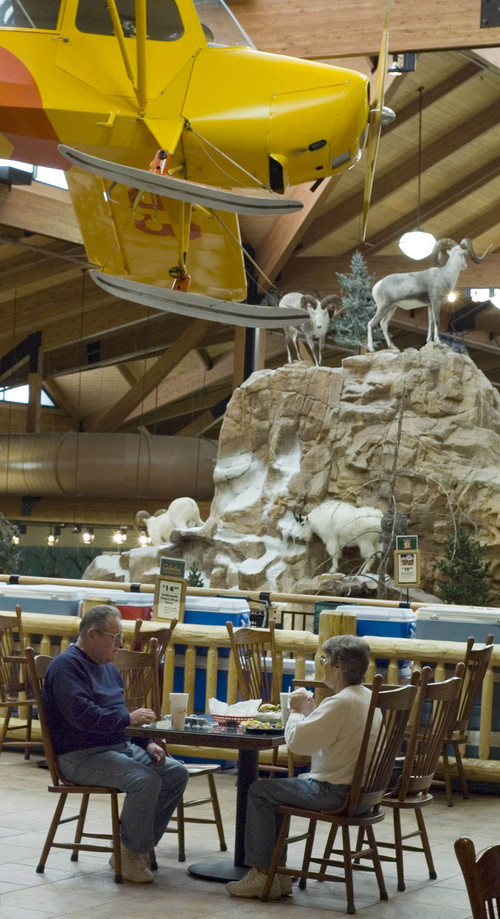 Steve Griffin  |  Tribune file photo
Stuffed animals on a giant mountain is a backdrop at Cabela's High Uinta Restaurant & Grill, which sits on the second floor of the Lehi store tucked under a giant poster of Kings Peak and under a real plane hanging from the ceiling.