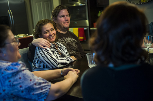 Chris Detrick  |  The Salt Lake Tribune
Sil Hoggan, Daren Hoggan talk with Kirsten Rice and Libby Sproat during a Childless Mormon Support dinner Friday May 9, 2014.