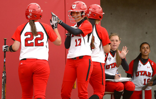 Leah Hogsten  |  The Salt Lake Tribune
Utah's' Anissa Urtez #17 congratulates teammates Shelby Pacheco #12 and Kendal Bergman #22 for their scoring runs in the bottom of the third. University of Utah women's softball team defeated Southern Utah University 12-4 during their first game of a doubleheader, Tuesday, April 22, 2014.