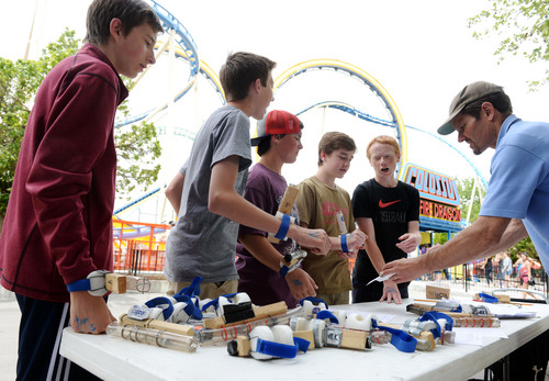 Steve Griffin  |  The Salt Lake Tribune


Churchill Junior High School students wear accelerometers on their wrists as they measure the force they experience on the Colossus Fire Dragon roller coaster during Utah State University Physics Day at Lagoon Farmington, Utah Friday, May 16, 2014.