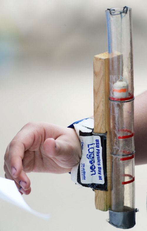 Steve Griffin  |  The Salt Lake Tribune


Junior high school students wear accelerometers on their wrists as they measure the force they experience on the Colossus Fire Dragon roller coaster during Utah State University Physics Day at Lagoon Farmington, Utah Friday, May 16, 2014.