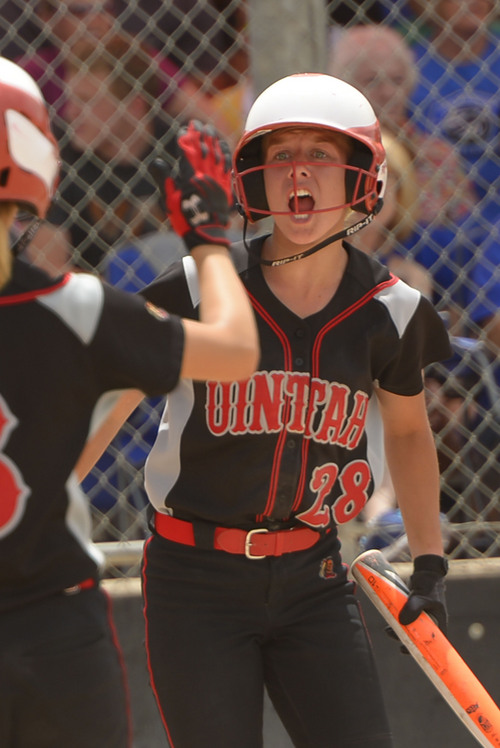 Leah Hogsten  |  The Salt Lake Tribune
Unitah's Kylie Smuin celebrates her scoring run in the 3rd inning. Stansbury High School girls softball team defeated Uintah High School 8-3 to win the 3A State Championship title Saturday, May 17, 2014 at the Spanish Fork Softball Complex.