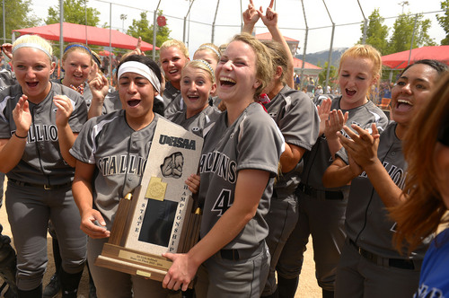 Leah Hogsten  |  The Salt Lake Tribune
Stansbury celebrates the win. Stansbury High School girls softball team defeated Uintah High School 8-3 to win the 3A State Championship title Saturday, May 17, 2014 at the Spanish Fork Softball Complex.