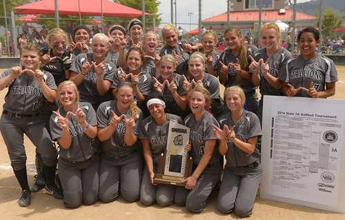 Leah Hogsten  |  The Salt Lake Tribune
Stansbury celebrates the win. Stansbury High School girls softball team defeated Uintah High School 8-3 to win the 3A State Championship title Saturday, May 17, 2014 at the Spanish Fork Softball Complex.