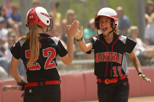 Leah Hogsten  |  The Salt Lake Tribune
 Unitah's Ashlyn Breakfield celebrates her scoring run in the 3rd inning. Stansbury High School girls softball team defeated Uintah High School 8-3 to win the 3A State Championship title Saturday, May 17, 2014 at the Spanish Fork Softball Complex.