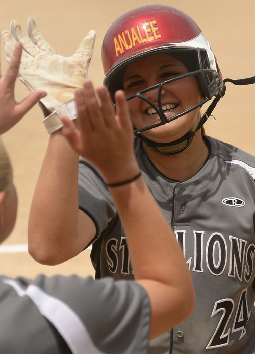 Leah Hogsten  |  The Salt Lake Tribune
Stansbury's Anjalee Batchelor celebrates one of her two home runs. Stansbury High School girls softball team defeated Uintah High School 8-3 to win the 3A State Championship title Saturday, May 17, 2014 at the Spanish Fork Softball Complex.