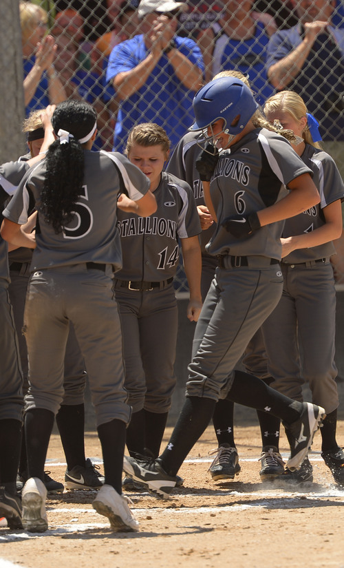 Leah Hogsten  |  The Salt Lake Tribune
Stansbury's Kilee Christiansen's (#6)home run in the first inning brought in two other runners. Stansbury High School girls softball team defeated Uintah High School 8-3 to win the 3A State Championship title Saturday, May 17, 2014 at the Spanish Fork Softball Complex.