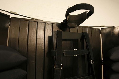 Trent Nelson  |  Tribune file photo

The execution chamber at the Utah State Prison after Ronnie Lee Gardner was executed by firing squad on  June 18, 2010. Four bullet holes are visible in the wood panel behind the chair. Gardner was convicted of aggravated murder, a capital felony, in 1985. Gardner's family will gather Saturday to mark the anniversary of his death.