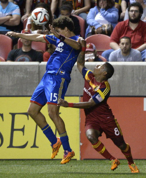 Rick Egan  |  The Salt Lake Tribune

Colorado Rapids defender Chris Klute (15) goes for the ball along with Real Salt Lake forward Jou Plata (8), in MLS action, Real Salt Lake vs. The Colorado Rapids, at Rio Tinto Stadium, Saturday, May 17, 2014.